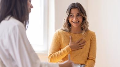 
		Happy woman at the doctor's
	